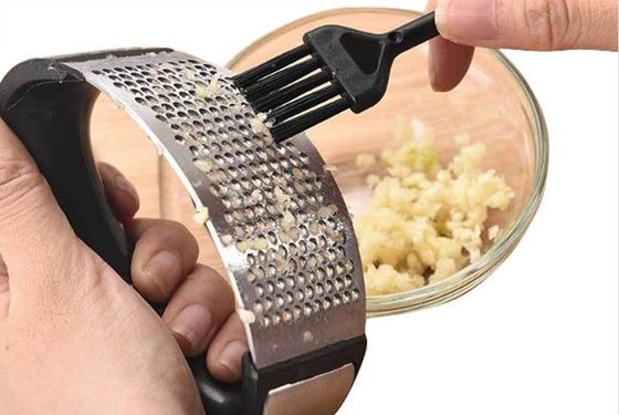Bestseller Hot Garlic Press Peeler Manuelle Edelstahl für Obst- und Gemüsewerkzeuge